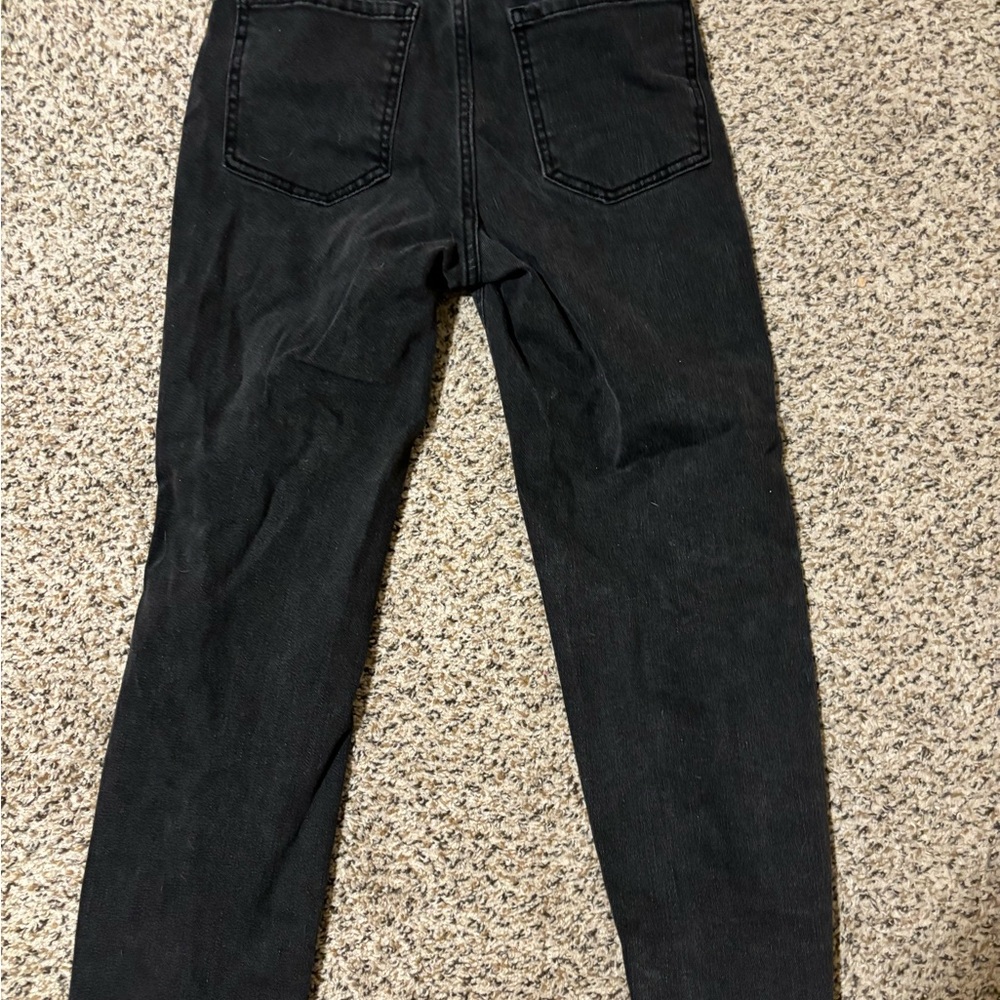 Black jeans with rips